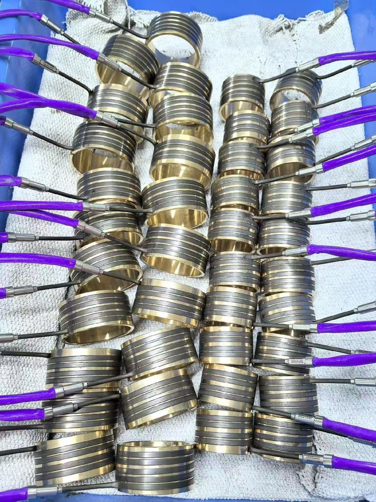 Hot runner coil heaters in production